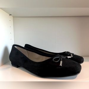 Black Ballet Flats in suede like material. Women’s size 11.